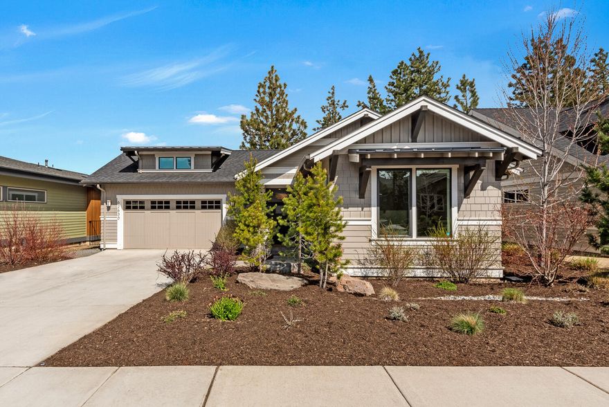 Welcome to Three Pines Ridge, where tranquil living meets outdoor adventure in NW Bend. This stunning one-story home offers the perfect blend of contemporary comfort and modern luxury. Impeccably designed with high-end finishes, the open-concept layout boasts a spacious great room with abundant natural light. Chef's kitchen featuring quartz countertops, stainless steel appliances and a spacious island perfect for hosting gatherings. Three bedrooms and two baths provide ample space for all. A generously sized office offers versatility for remote work or creative pursuits. Step outside and enjoy the warm glow of the fire pit, perfect for cozy evenings under the stars; or enjoy ultimate relaxation in the hot tub, where bubbling jets melt away the stresses of the day. The spacious garage offers ample storage for all your gear. Immerse yourself in the beauty of Bend, with direct access to Shevlin Park and an extensive network of hiking and mountain biking trails right outside your door.