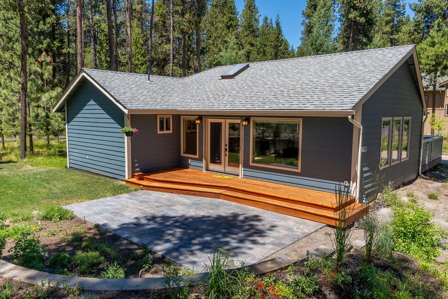 Come discover one of Central Oregon's best kept secrets! Welcome to the River Meadows community nestled along the Deschutes River and National Forest Lands just 12 minutes south of Sunriver and miles from ordinary. Easy access to lakes and mountains makes this home a peaceful oasis in the heart of unlimited adventure. Situated on a spacious .23-acre corner lot, this beautifully updated, sunshine streamed single level home offers 3 bedrooms and 2 bathrooms in an open 1,216 sq. ft. of living space. Seek the sun or shade in the 2 outdoor living areas offering composite deck, paver patio, and lush lawn. You will enjoy the birds, butterflies, and wildlife that visit the flower garden! A paver driveway and detached 2-car garage allows plenty of room to store your gear! Resort style amenities including a swimming pool, pickleball and tennis courts, clubhouse, gym, 3-miles of paved bike/walking paths, community boat launch, and RV storage offer something for everyone. Welcome home!