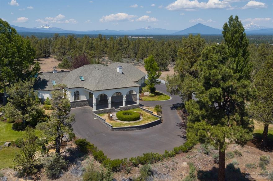 Welcome to Lion's Gate! This beautifully appointed, 50 acre custom-upgraded estate w/ breathtaking Cascade Mountain views, sitting high above its private land overlooking Tumalo farmland is the perfect place to entertain in luxury. Take a dip in the pool, relax in the gazebo or sit by the fire in the living room or master bdrm. Detached shop/3 car garage w/bathroom below the hill can accommodate RV's, additional vehicles & plenty of storage space. Recreational options abound on the estate's private acreage.