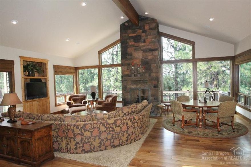 Very private, end of cul-de-sac location, sitting on a gorgeous treed setting above and overlooking the 15th fairway of Broken Top golf course. Beautiful Northwest Lodge inspired home lets you feel like you're living in a tree house. This home provides approximately 5,000 sf of living space, 4 bedrooms, 4.5 bathrooms, dedicated office/den, nice sized bonus room, plus an oversized heated triple car garage.