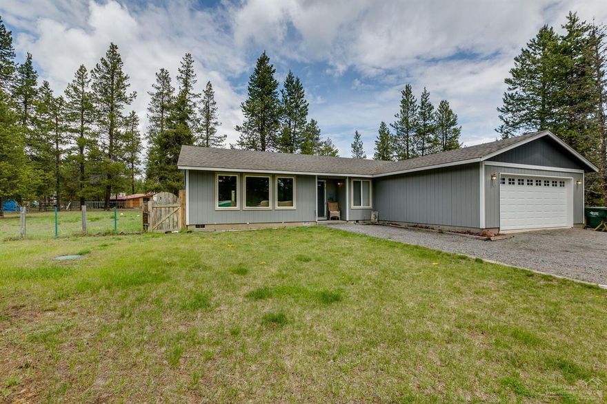 Light and bright easy living spacious floor plan on one level on this 1 acre lot nestled in the pine trees with plenty of space for your toys or to build a shop. Large fenced back yard with a extra storage building and room for the pets. This home has been well cared for with some newer updates including...New insulated garage door/tracks, paint inside and out, carpet, bedroom and closet doors replaced, new sliding glass door and several heaters upgraded. 20 minutes to Bend from this quiet home in the country.