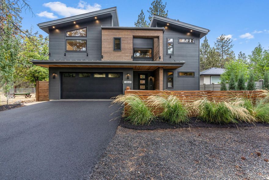 No HOA and potential for ADU! Enjoy the best of Bend living in this modern Earth Advantage Platinum Bend home by the Deschutes River. Step out your back gate to float the river or enjoy the short stroll along the river trail to the Old Mill. This meticulously maintained and well-designed home has high-end finishes, an open floor plan and a private setting with beautiful river views, mature trees and rock outcroppings. The yard is fully fenced with low-maintenance landscaping, perfect for enjoying all the great recreational activities Central Oregon offers. Centrally located in the heart of Bend, you can be up on the slopes and trails in no time or be dining downtown in just minutes. (Images of potential ADU photoshopped, no plans available)