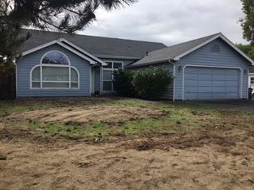 Very spacious home with vaulted ceilings on a very large lot. Attached 2 car garage and huge backyard! Check with Planning for other possible development with the large lot and access around the home. Possibilities abound!