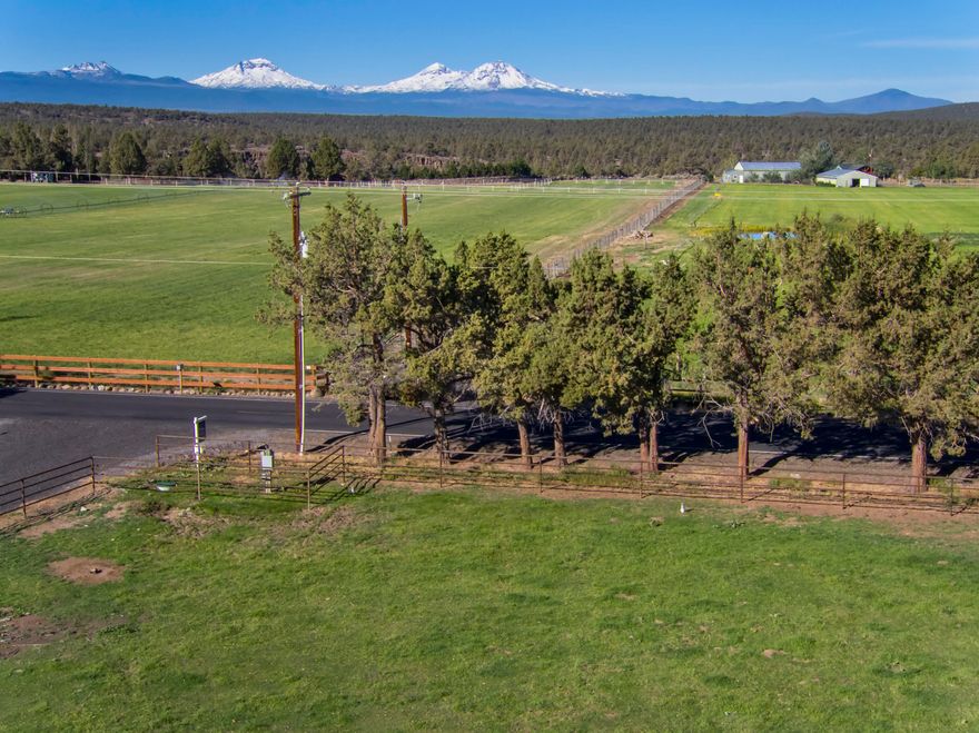Tranquil building parcel on Redmond's southwest side. This 5 acre parcel offers a superior opportunity to design and build your dream home to capture the impressive scenery. Huge Cascade Mountain Views. Wildlife abounds in this special location. Bring your animals, horses & livestock. Grow a garden, park your toys, & RV. 4.9 acres COID. Property is fully fenced and cross fenced with custom welded 4 rail pipe fencing. New permanent power vault on property.