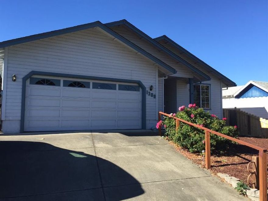 One owner 3 bedroom 2 bath single level home on .14 lot. 1474 sq.ft. plus a finished 420 sq.ft. attached garage. Double gate offers room for a large RV with dump and electric. Easy care landscaping. Roof less and 6 months old. There is room under home for additional storage. 12'X8' finished storage building at back of home. Covered deck off eating area. Heat pump w/central air plus there is an attic fan with vent to interior of home for added cooling. Pellet stove. Walk-in pantry and storage off the kitchen. Kitchen has a closet pantry, Jenn-air range, dishwasher, garbage disposal. Light, bright interior. Living room with vaulted ceiling and ceiling fan. All bedrooms have ceiling fans.