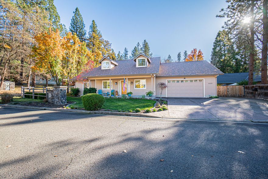 Stunning custom built in sought after Anglers Cove in beautiful Shady Cove. This is a quality neighborhood and just steps from the Rogue River on a peaceful cul-de-sac and walking distance to the famous Rogue River, known for world class fishing, rafting hiking and more. The home features 4 bedrooms, all on the main floor plus a livable loft space accessed by a spiral staircase . The dream kitchen welcomes you with ample cabinets and pull-outs throughout,There is also a finished bonus room above the finished garage for guests or gym, office, art studio, or?  Large primary suite with ADA shower and easy access to the rear covered patio. All the bedrooms are very generous in size. Sweeping vaulted ceilings with dormer windows allows for ample natural lighting. The lot is large at  .31 / acre and features mature plantings  with fruit trees and raised beds and a very private rear yard with covered patio, garden area and a beautiful pergola, all of which creates the feel of a sanctuary .