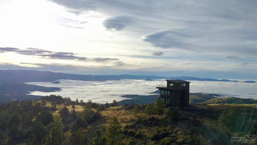 Keyes Mountain Ranch is made up of 2,124 acres situated in Wheeler County, just a short distance from Mitchell, Oregon. The property features three main structures: The Tower House, The Man Cave/Shop and The Cabin. The Tower House is a three-story structure sitting atop the 6,000-ft Keyes Mountain. The Home has full utilities and incredible panoramic views.