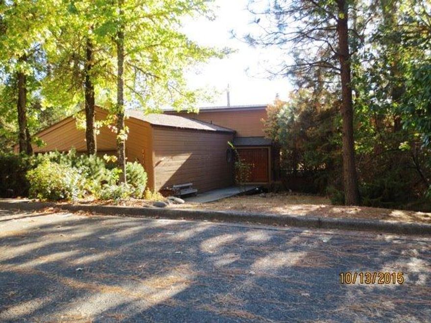 Beautiful contemporary styled home. 4bd/2.5ba, approximately 2943 square feet. Master on main floor, light & bright, picture windows, vaulted ceilings, hardwood floors, fireplace, kitchen w/tile counters, oak cabinets, tile in baths, downstairs family room w/wet bar, in-ground pool, deck. Some deferred maintenance. Being sold as is. Large .55 acre lot. This property is scheduled to be included in an upcoming online marketing event with Xome Inc. Auctions schedule 2/6/2016 to 2/11/16.