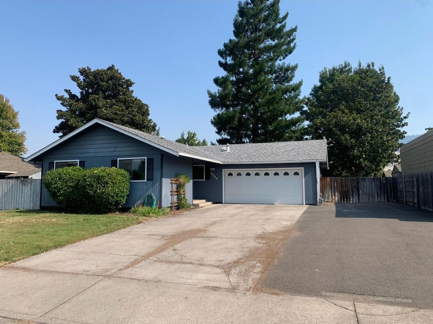 Great first time home buyers, or investment property.  This home is located in the Hedrick, North Medford School District.  Three bedroom, two bath home on a larger lot.  The home has large RV parking and well taken care of lawn.  Come put your personal touch to make this your forever home.