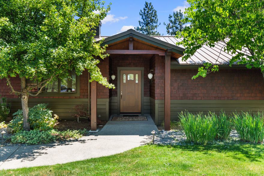 Elegant, well appointed home. Dramatic cathedral vertical grain cedar vaulted ceilings highlight this open floor plan. The large gas fireplace has a natural stone surround. Oversized sliding glass doors draw you to the outside deck and the expansive views of the valley below, as you enjoy the peaceful, beautifully landscaped front and backyard. Beautifully designed gourmet kitchen with high quality Maple wood cabinetry along with a center island chopping block. Viking stove and ovens, Subzero refrigerator/freezer and a stacked SubZero refrigerator drawer. The kitchen counter tops are made from stylish Roho Alicante marble. Multiple skylights for an abundance of natural light in this state-of-the-art kitchen. The breakfast area is a cozy nook with a gas lit fireplace. Three bedrooms with high quality finishes, master bedroom has both soaking tub with marble surround and separate shower.  Raised beds for growing organic fresh vegetables. A perfect mix of deciduous trees and tall pines.