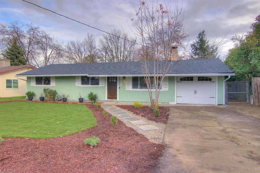 This 3 bedroom 2 bath home has been completely custom remodeled, and is located on a quiet dead end street in West Medford close to Jacksonville. This home is in the county on over a quarter acre flat lot - lots of room to grow! Yard has backyard access and is large enough to pull in your RV, build a workshop, add a pool or a greenhouse. This home has been completely restored and supplied with Smart Home technology such as Samsung keypad/key card entry, home motion monitoring and recording system, Ring camera doorbell and more. The home has fresh paint inside and out. New kitchen cabinets with granite counter tops and stainless steel appliances. The home has a gorgeous custom tile working fireplace. There is a 288 square foot single car garage, with new smart wi-fi enabled automatic garage door opener. Inspection report available online.