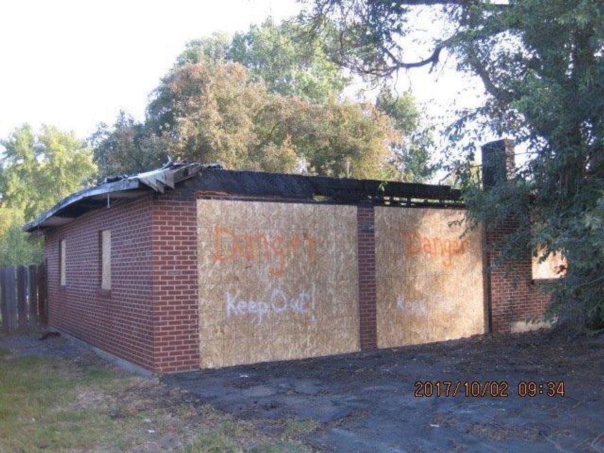 This property is being sold as-is with value to the land. The structure condition is unknown with little to no value. Buyer to do there own due diligence regarding utilities, zoning building regulations, demolition, etc. All offers to be submitted by a licensed Broker in res.net.. Earnest money deposit to be a minimum of $1,000 or 1% of the sales price, whichever is greater.