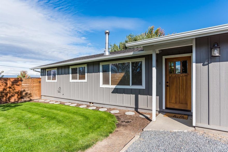 Your search ends here. This single level home on 1/2 acre in Bend features 2 master suites, an over sized garage with shop area, RV parking, hook ups, and a fenced back yard with large decorative patio, a willow tree perfect for a swing and a pond/water feature. Addition was professionally done in 2018 to include a new master suite, dining room, laundry room and garage extension. 4 bedrooms, 3 baths, new master closet and pantry designed and finished by California Closets, wood stove and A/C. This home is perfect year round.