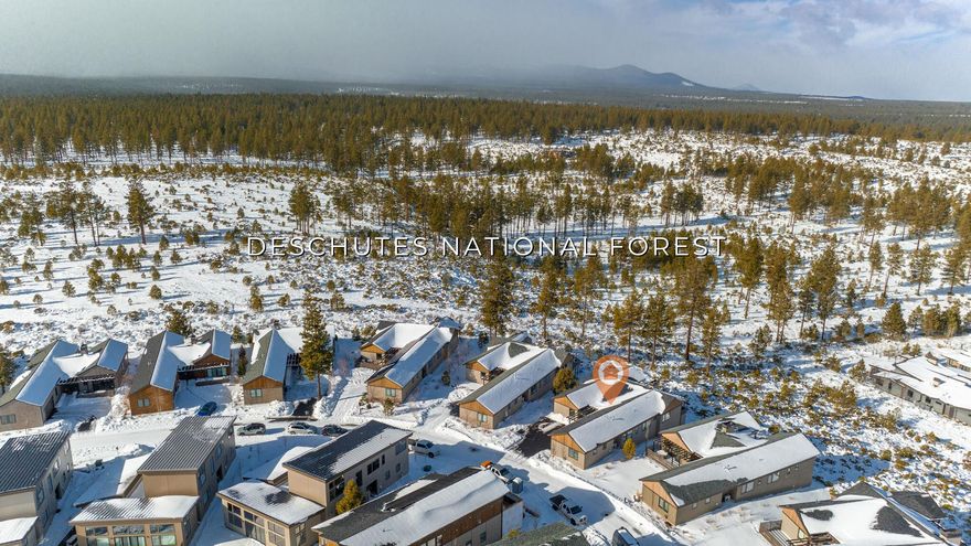 This beautifully appointed single-level home built by BendTrend Homes in Trailhead in Tetherow boasts superb craftsmanship and luxury finishes throughout. The vaulted great room with gas fireplace opens onto the walkout deck with protected views of the Deschutes National Forest, Cascade Mtns, golf course, and features covered and sunny outdoor spaces. Chefs will love the well-appointed kitchen featuring a Wolf range and drawer microwave, Subzero built-in fridge and wine fridge, 12 ft island w/eating bar, and walk-in pantry. The primary suite offers separation from the other bedrooms and includes motorized blinds and en-suite bath with dual-head tiled shower and radiant heated floors. Two Jr. Suites share a hybrid Jack & Jill bath and the large 4th bedroom doubles as a flex/bonus room. The oversized 2-car garage is outfitted with cabinetry, storage racks, and Swisstrax flooring. Don't miss the 1100 sq ft  finished, locking storage area under the house. Full golf membership included!