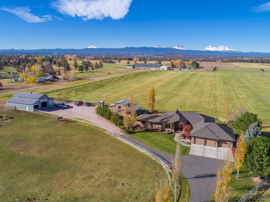 Prime Tumalo Location! Just minutes to Bend, Redmond and Sisters! Outstanding Cascade Mountain views! Open floor plan, living room with gas fireplace, wood floors, office, piano room, master suite, deck, attached 3 car garage. Landscaped with sprinkler system. Barn/equipment storage, detached studio/office. 41+/-acres with 39+/-acres of irrigation. In orchard grass hay and pasture; fenced with gated, paved driveway. In the heart of all of the recreational amenities Central Oregon has to offer!