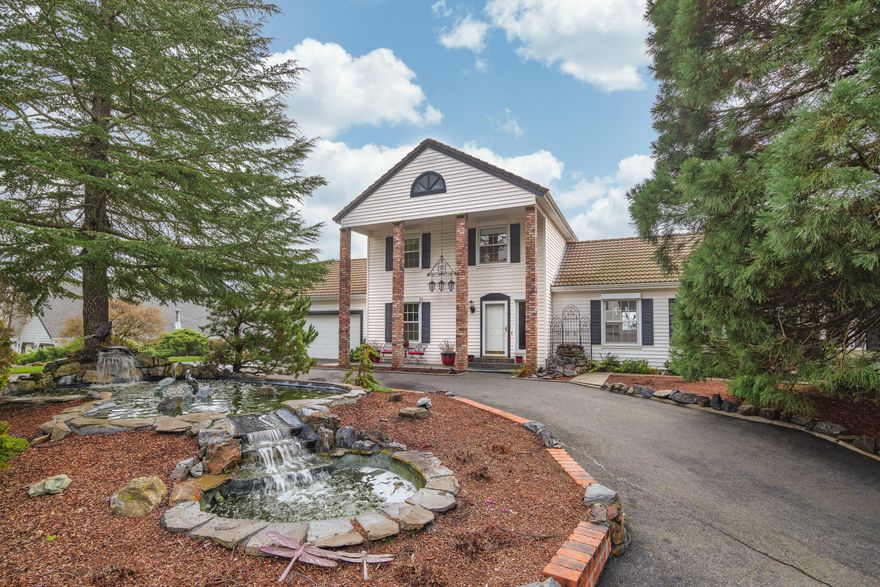 Back On Market and priced to allow for updates and/or extra savings! 
Move In Ready!  Beautiful Mountain Views! Huge shop! Pool!
This gated 1983 Colonial-style home offers 2,992+ sq. ft. of living space with sweeping valley & mountain views that will take your breath away. This 5-bedroom, 3.5-bathroom home is designed for comfort  & versatility, featuring two spacious primary suites—ideal for multi-generational living or hosting guests. An additional760+ SF   unfinished basement offers extra storage.

The back patio and pool area provide the perfect setting for relaxation and entertaining.

Car enthusiasts & hobbyists will love the incredible garage spaces, including an attached 2-car garage, a 34 x 50 garage/workshop with air compressor, and drill press, and an additional 32 x 23 garage with a loft and 3/4 bath.

This gated property combines privacy, stunning views, and incredible amenities. Don't miss the opportunity to make this exceptional home