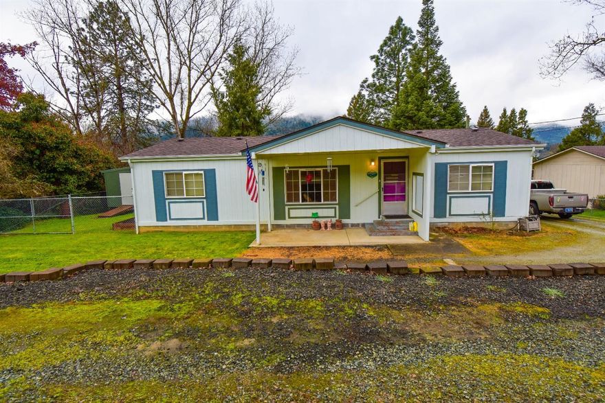 Well cared for 3 bed 2 bath manufactured home. This home is situated at the end of the street on a well appointed lot with abundant parking. Inside your welcomed by a large family room and dining space, a large open kitchen with more than enough cabinet and counter space. The master suite features a large bath and walk in closet, and the auxiliary bedrooms are large and just off the second bath. Outside you'll notice the large deck perfect for relaxing, a large grass yard with mature trees, and a 200sf storage/work space all of which fully fenced and gated.