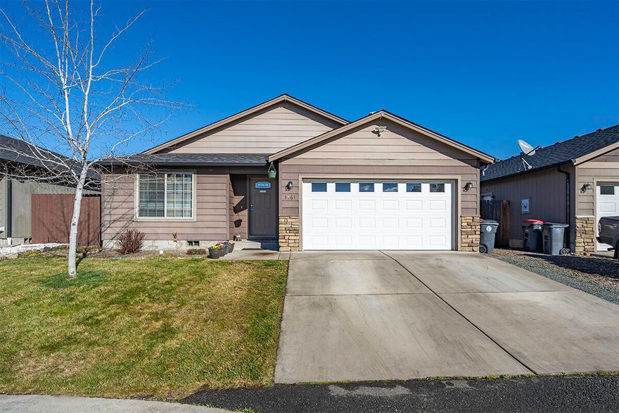 DO NOT MISS OUT! Beautiful home in the Sage River subdivision in White City! This fantastic three bedroom & 2 bathroom home is ready for its new owners! Spacious living room with large windows, vaulted ceilings & built-in shelving high up for all your home décor! The living room opens up to the beautiful kitchen and dining room area.  Glass slider in the dining room opens up to the backyard & patio - great for entreating guests! Lots of storage possibilities in the hallway linen & coat closets. Master bedroom has tall ceilings & a big window - not to mention the large closet & spacious bathroom! The 2 other bedrooms are both great sizes, one could even be used as an office! Large house bathroom with ample countertop space. The laundry is in a sperate room & has an abundance of storage options & has a door going out to the large garage. This adorable family home is a MUST SEE! Come & tour it today before it is too late!