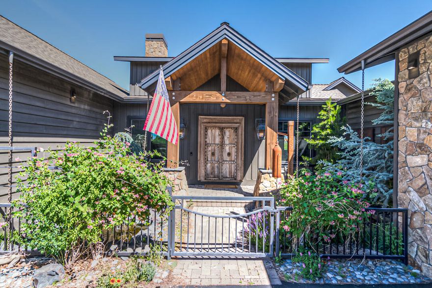 Welcome to Brasada Ranch! This spectacular home is nicely positioned on the 15th fairway & boasts stunning golf course & big mountain views!  This home is built to entertain & comes furnished. Enjoy watching movies on the big screen w/ your own private media room & entertain guests in the bonus room complete w/ pool table, shuffleboard & wet bar! Entertaining outside is made easy w/ a large covered patio, built in BBQ, TV & fire pit. Primary bedroom on the main level & includes: stone fireplace, private balcony w/ hot tub, free standing copper tub, steam shower w/ dual shower heads & two walk in closets. Enjoy cooking in the chef's kitchen with its 60'' Viking 6-burner range w/ griddle, grill, double ovens, subzero fridge, copper sink & butler's pantry w/ wine fridge. Two guest bedrooms and access to lower patio. Mature landscaping and private, serene setting. Enjoy the resident deer, owls & quail that meander through the beautiful & artfully crafted backyard space.