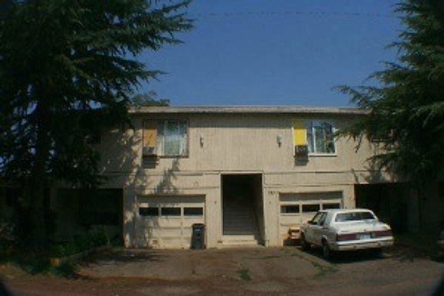 Price reduction from @219,000 down to $199,900, for a quick sale! 4 plex needs some work. Easy to keep rented - each unit has washer/dryer hook ups & (1) car attached garages.