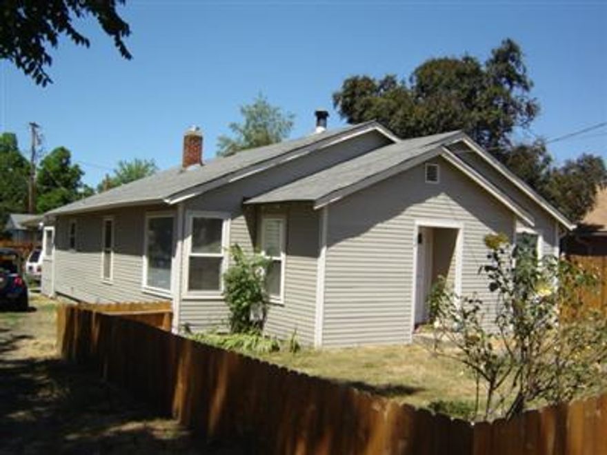 Call your investors!!! Here is a great investment opportunity. Two homes located on one tax lot. The frint home boasts 1518 sq. ft with 3 bedrooms & 2 baths with new exterior siding, new windows, new laminate flooring in teh kitchen, new tile in the main bathroom and front door entryway. This is a very cute home. The second home offers 807 sq ft (per owner) with 2 bedrooms & 2 bath and is currently renting for $625 per month. Tenants in second home would like to stay. This property would also be a perfect fit for someone who wishes to live in one home and rent out the other.