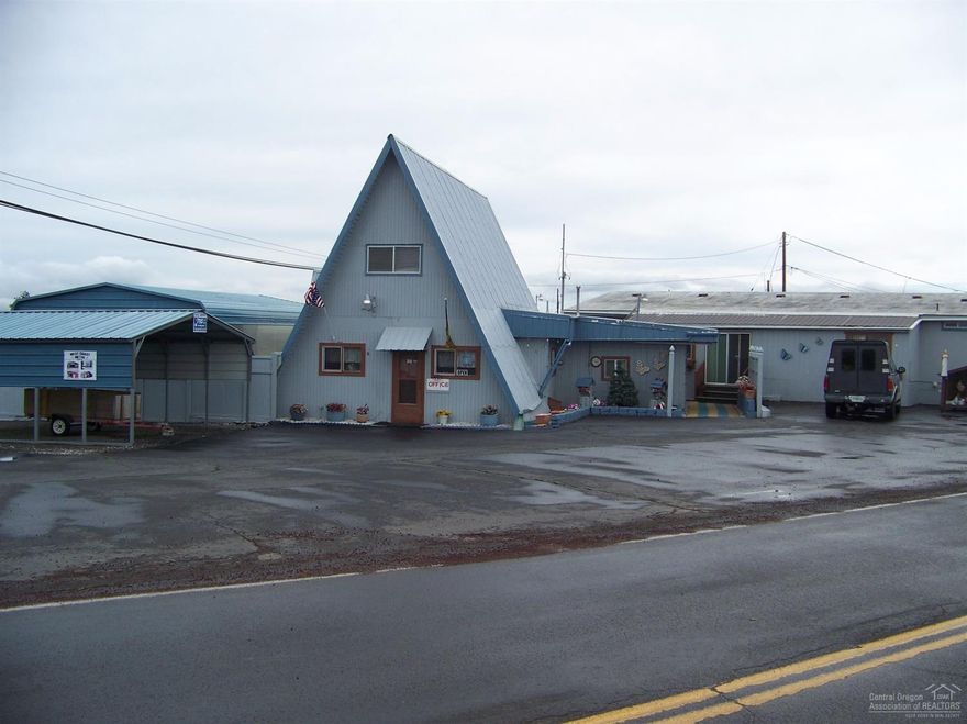 Huge opportunity here. TOPS Mobile Park has been in business for many years. 30+ mobiles are currently renting with a total of 60 spaces available to hook up. Another approximately 2.5 acres more of undeveloped ground is included. Perfect for the solar eclipse space renters. Easy access and a wonderful location between Hwy 26 and Depot Rd. Also included a very nice 1997 owner/manager home. A-Frame office building, laundry facility, even a swimming pool. Possible assumable loan for a qualified buyer.