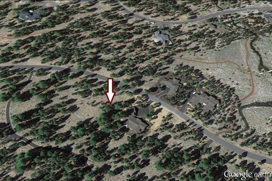 This wooded lot has a tranquil view to a large common area and a southern orientation to the rear. Build your dream home here, and start enjoying all the amenities that Caldera Springs has to offer: Quarry Pool & Fitness Center, Caldera Links par-3 golf course, acres of accessible lakes for fishing and kayaking, miles of paved and soft trails, community parks, adventure playground, tennis, basketball, Zeppa Bistro and Lakehouse.
