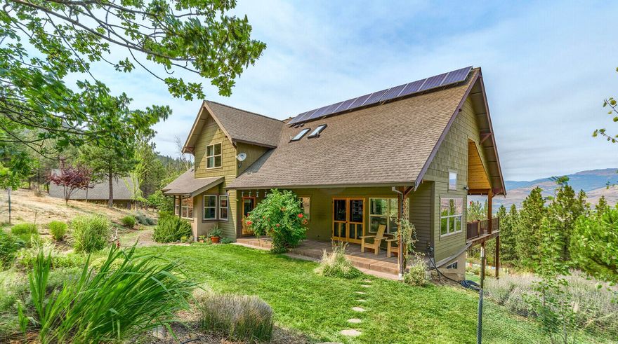 Stunning Earth Advantage home on 10 acres and just minutes to downtown Ashland. This rare opportunity allows for self-sufficient living with room to grow vegetables, fruit, hike on your own trails and enjoy wildlife. The open concept floor plan has a wonderful great room with views of Grizzly Peak and access to the deck that runs the length of the home- indoor out living at its best. The chef's kitchen has top end appliances and huge central island with a breakfast bar. It opens to a covered patio that looks to the forest and oversized in-ground hot tub. The primary suite sits on the main floor has two walk-in closets and large en suite bathroom with soaking tub and walk-in shower. Upstairs are two spacious bedrooms and J&J bath. Downstairs are two more bedrooms, full bath, and bonus family/music/media room- perfect for guests or home office. Bordering the extensive trail network of Oredson Todd and close to markets and schools of south Ashland makes this a truly unique property.