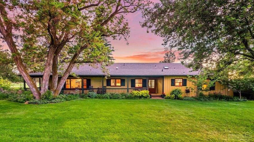 The best of all worlds! Historic yet modern Tumalo Oasis. This rare property is a timeless retreat. Nearly 20 irrigated acres to create the hobby farm or horse ranch of your dreams! The captivating historic farmhouse has been fully renovated, yet lives with all the charm and character of its original style. Nestled under a majestic canopy of heritage trees this single level home is the real deal. Wrap-around porch, picture windows, orchestral songbirds, fragrant flowers and the reflection of the Cascade Mountains in the pristine pond. This home has 4 beds & 3 baths, yet also offers the opportunity to create a bonus room, private den or hobby room if you so desire. Well-appointed kitchen with slab surfaces, stainless appliances, island & pantry. Heated tile floors in the designer inspired baths. 3-car garage w/ workshop, shed and tractor barn. Lush gardens. Country Living with best of modern life, minutes from charming Downtown Tumalo & a short drive to Bend. Country quiet, city close!