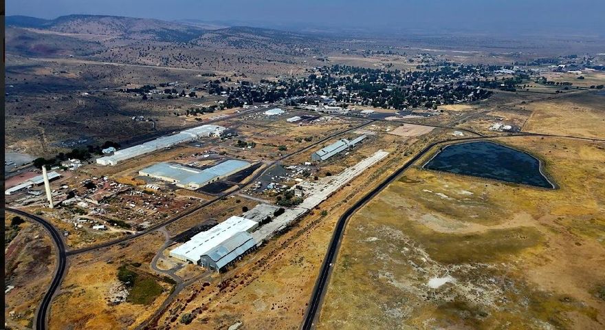 Industrial Zoned Land with Concrete Slab on 9.70 Acres
Featuring a 960 sq ft concrete structure that previously served as a sawdust lumber mill hopper, this property includes a large concrete pad covering most of the land. Access is granted via an easement on Snow Mountain Pine Lane, with the property adjacent to Hotchkiss Lane. A lot line adjustment is required, and taxes are yet to be determined. Seller is a licensed agent in the state of Oregon and the listing agent.