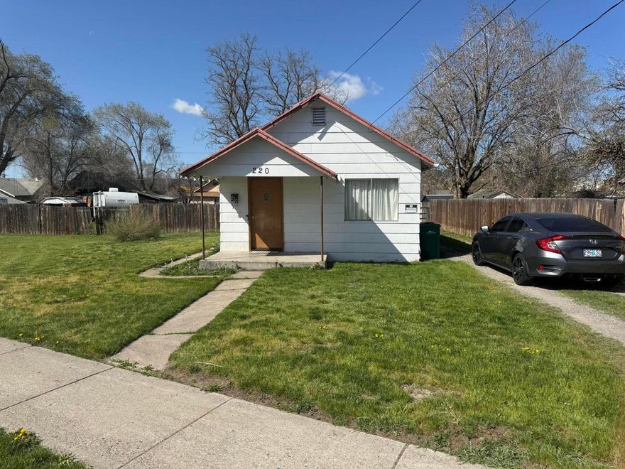 3 bedroom 1 bath home in the city limits. Close to public transit and downtown area. Two city lots with lots of parking and fencing for privacy. Work shed located in the back of the property. Lots of storage space in kitchenarea. Sizeable living room with lots of windows and lighting. Central forced air and updated wiring and plumbing in 2010. Property is being sold-is.