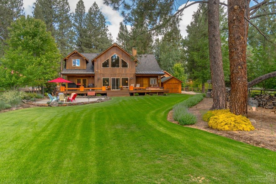 You just found your dream home on the Deschutes River! Located in the heart of all the recreation Central Oregon has to offer, this property is a short drive to Sunriver, Mt Bachelor, the Cascade Lakes, and 20 minutes to all the action in Bend. This home has everything. Extensive decking and paver patios, with rolling grass to 100 feet of unobstructed river frontage. The home boasts quality craftsmanship from the moment you walk through the door, log accents throughout, large open floor plan with stunning wood ceilings, rock fireplace, views of the river at every turn, gourmet kitchen with large island, high end appliances, the master suite is on the main floor, large bonus room, 4 bedrooms or flex space, three full baths, this is all on 1 full acre with room for RV, separate 700sf shop, multiple quality outbuildings for all the toys. Home is being sold furnished. Just bring your fishing pole.