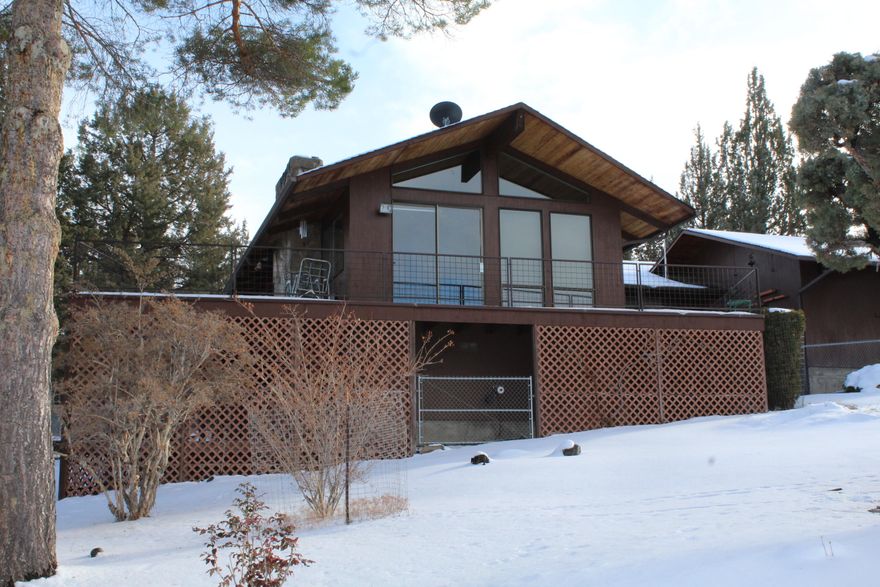 Private location with wonderful views. This well-built ranch setting home has a nice private feel and ambiance. Come take a look and you will see this is a great place for you to land next.  It is set up with room for a few horses with the barn and tack room but would also make a great shop. The home offers great northerly mountain view, open great room with fireplace with wood insert, open well-planned kitchen with lots of thoughtful storage, wrap around porch and attached garage.