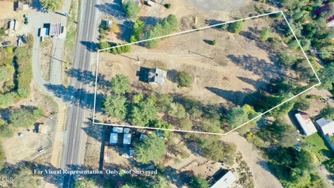 Photo of 33105 Redwood Highway, Cave Junction, OR 97523 (MLS # 220229856)