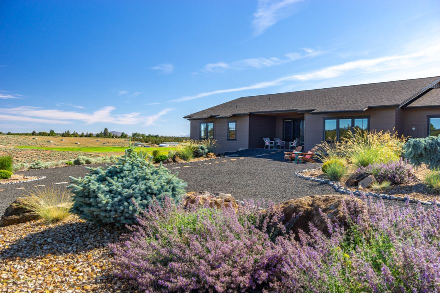 Immaculate Tumalo acreage on a quiet country road, Don't let the size fool you, the grounds are easily managed thanks to push-button underground irrigation and a meticulous hardscape. Stunning views from Bachelor to Jefferson. SW facing covered back patio is a great spot to watch elk and wildlife. A greenhouse and lovely garden (deer fenced) provide the ideal spaces to grow your own produce. Delight in having your own private domestic well with excellent water flow. One level home built by local artisan Gary Laursen reflects attention to detail & thoughtful touches. Exercise room, 1050sf shop, and immaculate grounds round out this beauty. EFU zoned w/ potential to subdivide or add a hardship dwelling, buyer to investigate.