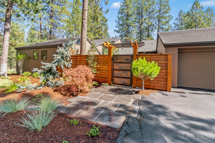 One of a kind light-filled NW Contemporary home, built on the premier lot by the founders of Widgi Creek, lies along the Deschutes River side of the development overlooking a pond. Extensive remodeled interior in 2018 includes new paint, 3 contemporary bathrooms with heated floors, refinished hardwood floors, wool carpeting, and epoxy garage floor. Inside the home are 2 offices, several window seats overlooking the pond, family room, and living room with wood burning fireplace. 2019 exterior landscaping features a beautiful copper entry gate with heated tile for snow, leading to a private courtyard with Trex decking, water fountain and night lighting. Outside the courtyard, woodland xeriscaping with drip irrigation, large deck along the river side and grounds night lighting. The home opens to hiking trails along the Deschutes River, mountain biking access to the Bend Trail system, paved bike path to Bend, and only 15 minutes to Mt. Bachelor and the Cascade Lakes.