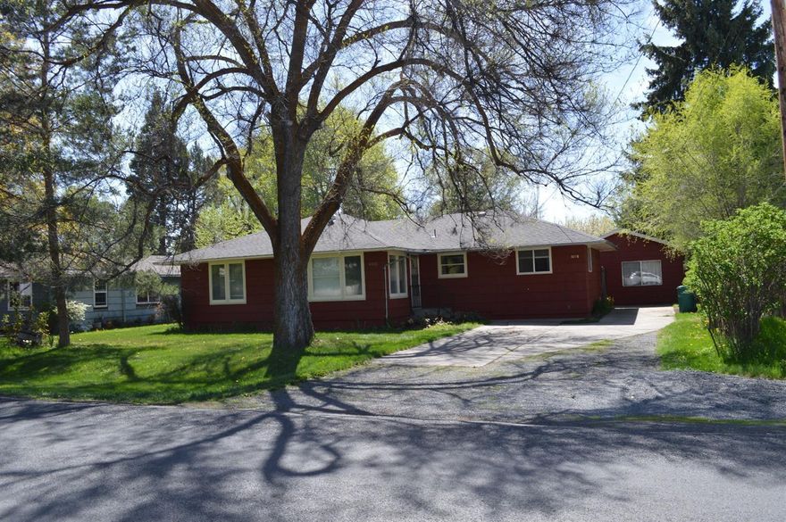 A Must See. Great Home in a desirable neighborhood near Peterson Elementary School. Home Has A 18 X 42 Shop With Area For Family Room That Could Be Converted Back To A Garage. Water Is Available In The Shop. Home Has 3 Bedrooms, 2 of Which Have Beautiful Wood Floors. The Kitchen Has Some Nice Upgrades. Move in Ready and Cozy Home. The Ceiling Fan Circulates The Heat. Very Nice Back Yard With Fruit Trees, Berries And Nice Garden Area. Bathroom Has Granite Counter Top With Upgrades and newer split system heating and air conditioning wall unit. Very efficient. RV Parking, Woodshed And Access To The Backyard.