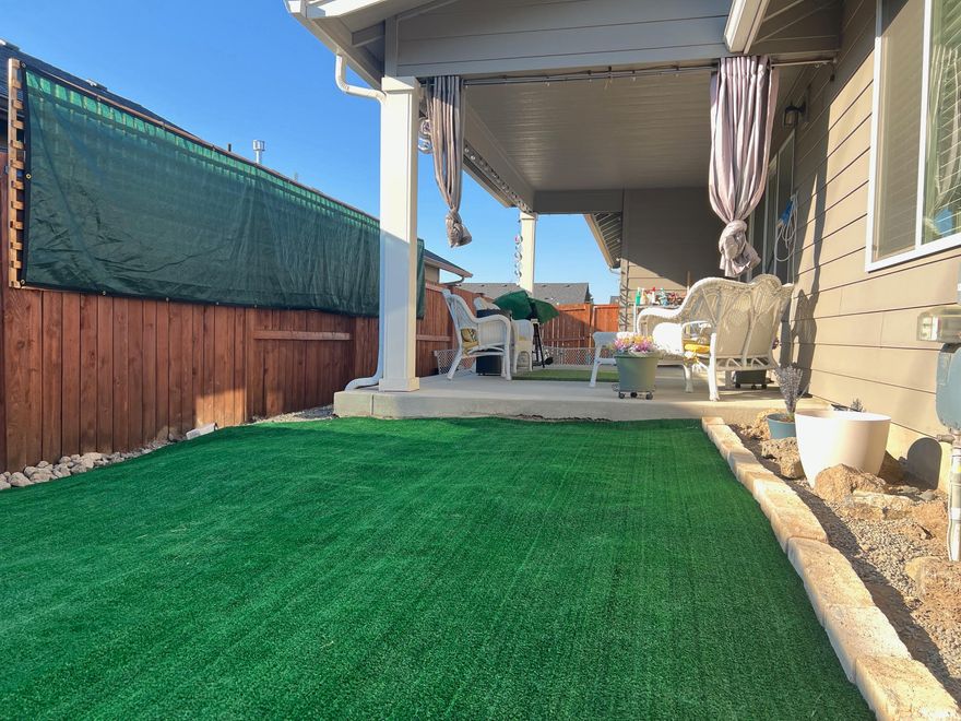 Located in the desirable Hawley Estate and built in 2020, this immaculate 1,605 sq ft single-story home is move-in ready. Featuring 3 bedrooms and 2 bathrooms, the open-concept floor plan boasts vaulted ceilings and abundant natural light. The spacious kitchen includes a large island with breakfast bar, quartz countertops, stainless steel appliances, a walk-in pantry, and white cabinetry. Enjoy the cozy gas fireplace in the great room and durable laminate flooring throughout. The primary suite offers vaulted ceilings, a double vanity with quartz counters, a walk-in closet, and a private enclosed toilet. Outside, relax under the covered patio in a fully fenced backyard. Additional highlights include a 2-car garage with opener and overhead storage, a large asphalt driveway, and a private walking path along the east side. This home combines modern design and practical features—schedule your private showing with your agent today!