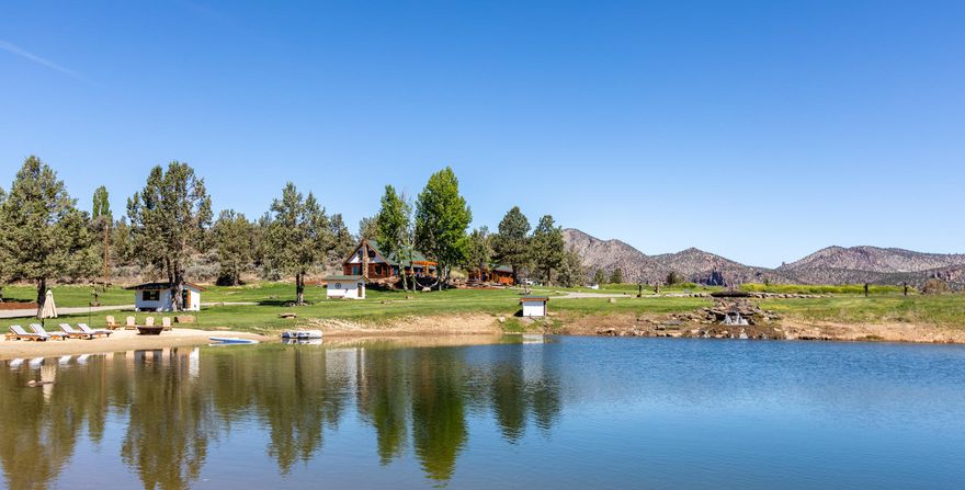 Remarkable opportunity to create a family legacy that will last for generations. A private entrance welcomes you to this irrigated 39+ acre multi-purpose agricultural property. Endless possibilities: Use as family ranch estate, second home, rental property, wedding venue, hemp crop, farm crops, or equestrian. Enjoy peaceful setting w/expansive views centrally located down the road from hiking/climbing the iconic Smith Rock, nearby RDM airport, and just 25 minutes to Bend. Set up to be low maintenance, upgrades includes 10+ acres of landscaped and fully automated irrigation. Follow the creek past the bridge and down the waterfall into a large pond complete with island, dock and sandy beach. Paddle board out or stock it with your favorite fish! This extensively renovated property was designer done and includes a 3 BD 3 BA main house, 3 car garage, and 5k sq ft barn. Enjoy the sunsets in your outdoor living space complete with custom pavers and fire pits. Zoned EFU for low property taxes.