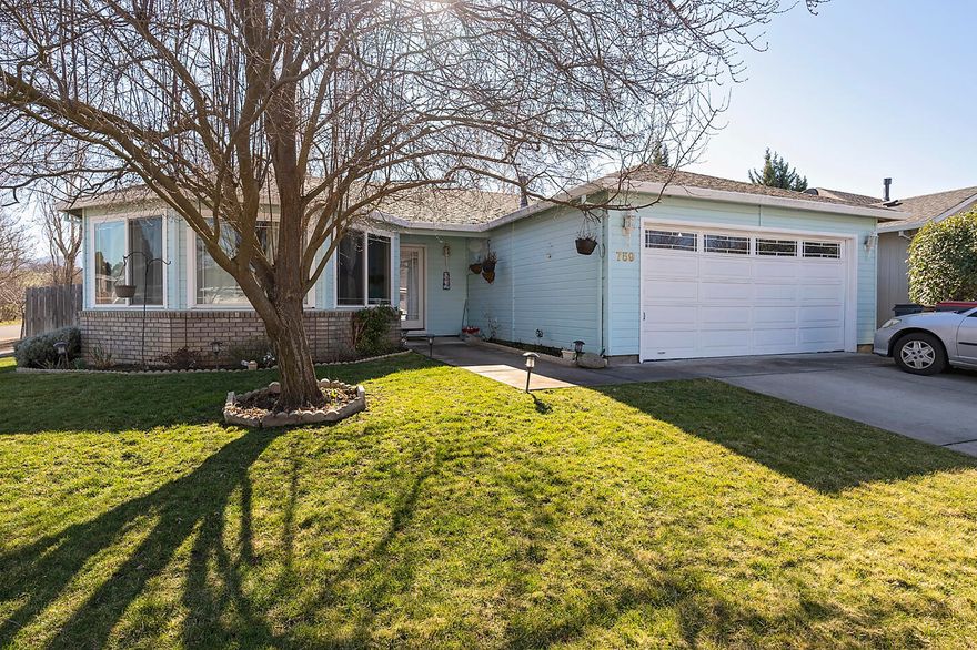 Well maintained home in South West Medford Location. The property is on a corner lot with ample space to garden and enjoy the covered paito out back. The home has a large Living room with bay window. Large kitchen with spacious counter space. Three full sized bedrooms with two baths. Upgraged hard wood flooring thruout.