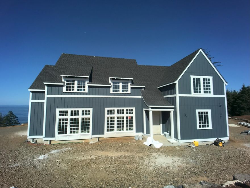 Nestled along the central coast amongst rolling hills and lush forested landscapes, this traditional Northwest neighborhood was thoughtfully crafted with a focus on coastal living for both full-time residents and guests. This newly constructed home is set high above the Pacific Ocean and has a layout that offers a great room perfect for entertaining, 4 bedrooms (including one on the main level), a bonus room, and spectacular ocean views. This home has designer-selected interiors, luxurious finishes, and ample patio space to enjoy the outdoors and is adjacent to the newly finished plaza, a perfect spot to hang with friends and watch the whales in the distance. Depoe Hills presents a unique opportunity for buyers seeking a coastal lifestyle rooted in community and natural beauty and since it allows short term rentals, there is always the option to earn some potential income while you are away. Ask your REALTOR for the short term rental projections.