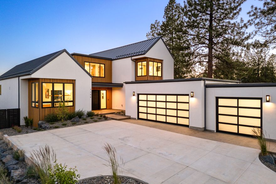 Experience the pinnacle of Scandinavian-inspired design in this newly completed SunWest Builders home in Discovery West. Nestled on an exceptionally private lot backing to a neighborhood park, this masterpiece seamlessly blends modern elegance with natural beauty. Inside, soaring ceilings and expansive windows bathe the home in natural light. The heart of the home is the stunning kitchen, featuring a sprawling 15' island, gorgeous custom cabinetry, and top-tier appliances. The main-level primary suite offers a private retreat, while upstairs boasts a junior suite, additional bedroom, a spacious media room, and a versatile den. Thoughtfully designed for comfort and style, the living spaces flow effortlessly to the rear courtyard with an outdoor fireplace—perfect for year-round entertaining. Located near trails, parks, and all the best of Bend living, this home is a rare opportunity to own an architectural gem in one of the city's most sought-after neighborhoods.