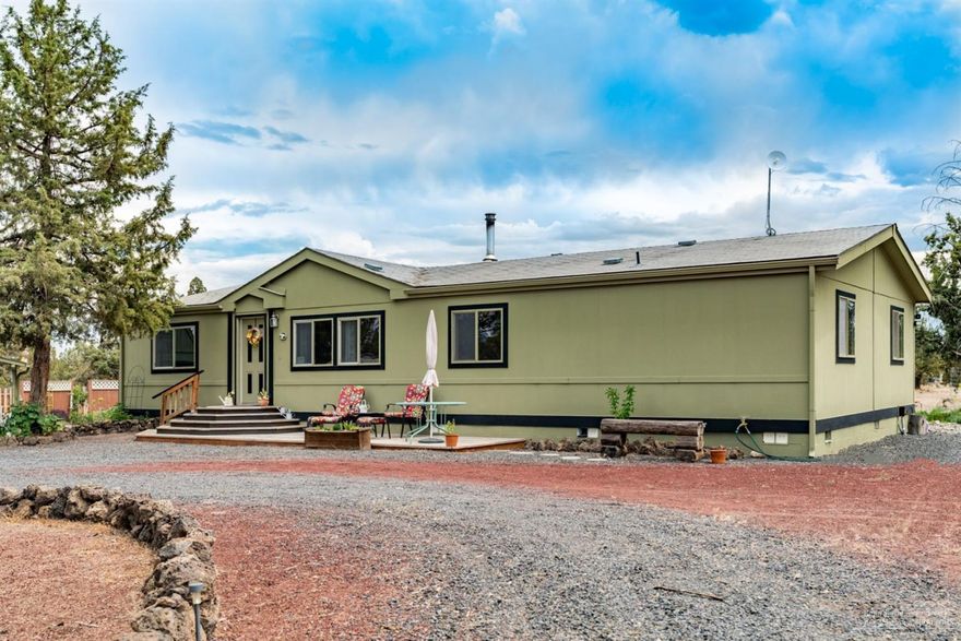 Well maintained manufactured home on 4.76 acres. 720 ft. private well. Lots of out buildings, plenty of storage. Close to BLM/ATV.