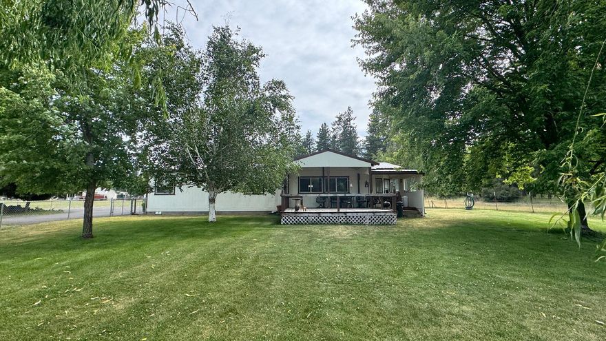 Well cared for home located in Keno with Peek-A-Boo views of the Klamath River. All new kitchen remodel in 2017 with upgraded appliances added in the last few years. Gas heat and cooking stove. Vinyl windows and ceiling fans through-out. Metal Roof on both home and garage. Exterior paint done in 2023. Updated flooring through-out. Large Primary and Secondary bedrooms. Open Living space with separate breakfast area and formal dining area. Certified wood stoves in both the house and detached finished garage. 1.96 acres fully fenced with some cross fencing, pasture, private well and access to river. Covered front deck with ceiling lighting. This house won't last!!