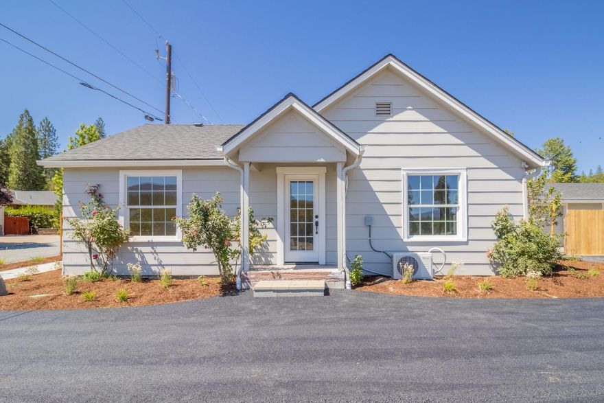 Vintage charm with all of the modern amenities! This is the perfect property for a 1st time home buyer, an investor, and everyone in between! This single level 1,010 SF home is full of recent updates including: new windows, drywall, roof, refinished hardwood floors,countertops, paint, as well as an updated bathroom! Outside you will find a 960 SF shop, a brand new paved driveway, cedar fence, and more on this 0.12 acre lot. There is nothing to do but move in! The shop could easily be converted to an ADU to make this an affordable investment property. This quiet  neighborhood gives this 2 bedroom, 1 bath home a wonderful setting. This property is just minutes from shopping, schools, parks, and the Rogue River! One of the sellers is a licensed realtor in the state of Oregon. Call for your tour today!