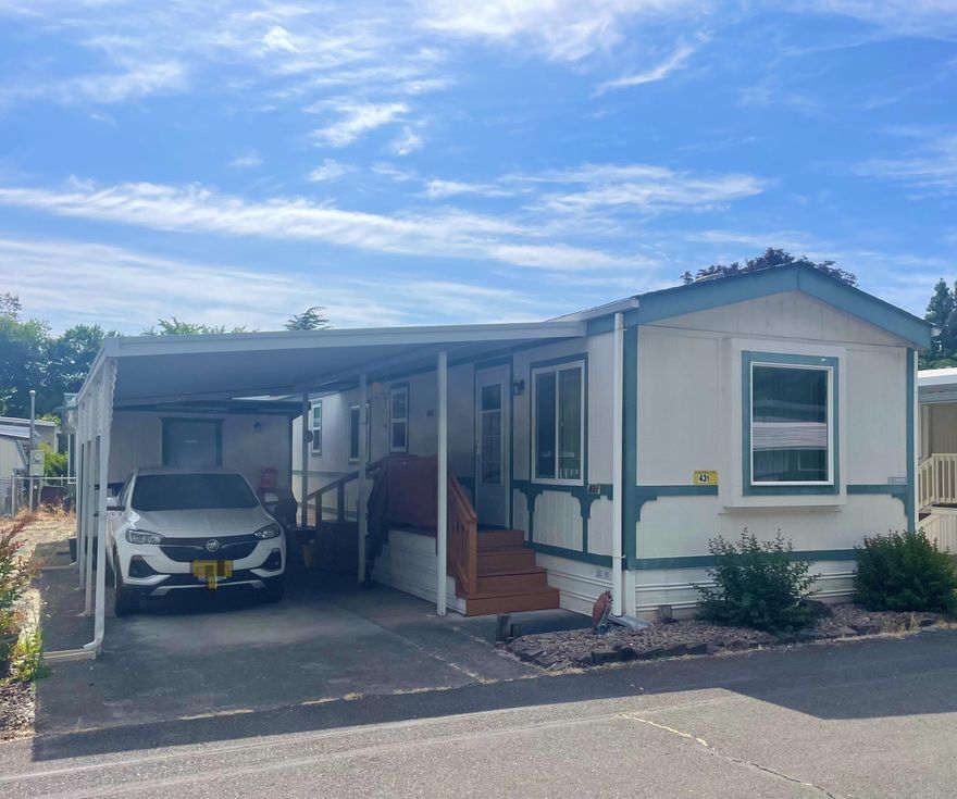 Looking for easy living by the river? This upgraded and move-in ready home in a 55+ park offers comfort, convenience, and community! With 2 bedrooms, 1 bath, and 784 sq ft of well-kept space, you'll love the updates—including a 2020 HVAC system with a prepaid service agreement for peace of mind. Enjoy a carport, spacious shed/shop, and a small fenced yard perfect for a pet or a garden. Extra parking available for your car, truck, or toys! The park features a game and rec room with a pool table, ping pong, and more fun just steps from your door. Quiet, clean, and close to nature—this is the kind of spot that just feels like home. Seller may carry with a significant down payment. Contact the park manager for details and to apply!