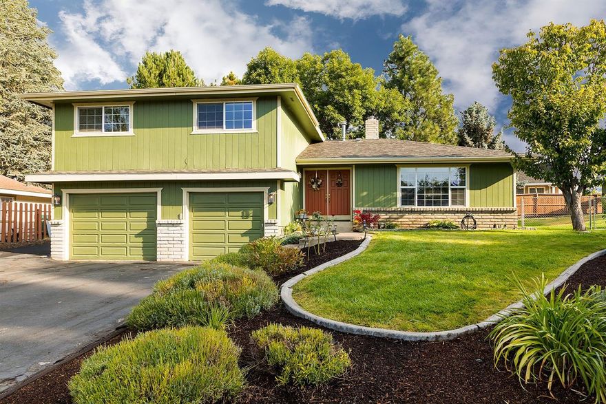 Gorgeous tri-level 4 bedroom 2 bath home in Henley area, with over 2,400 sq.ft. of living space with gas heat. new A/C, new hunter douglas custom honeycomb blinds & central vac. Formal living room with gas fireplace, nicely updated kitchen with stainless appliances, including a gas range & eating bar. Huge FR downstairs with Lopi certified WS. Upstairs there is a spacious master bedroom with walk in closet, and tiled remodeled master bath with shower. Located in a quiet cul-de-sac on .22 acres, with fenced backyard, large wood deck, storage shed, RV parking, oversized 2 car garage.