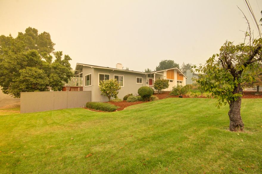 You will love this beautifully updated, spacious home with all the amenities! Huge lot with gated RV parking, custom in-ground pool complete with 'WaterWarden' 5 foot portable pool fence (not pictured but included in sale), multiple view decks, and potential multi-family setup! This home is turn-key and includes a brand new roof, new vinyl windows and sliding doors, new garage doors & motors, new exterior paint, new vinyl plank flooring downstairs to compliment the solid wood floor upstairs, all-new bathrooms, new granite countertops in kitchen, plus a floor to ceiling stone fireplace and 10' coffered ceilings in living room, laundry chute from upstairs bathrooms, and so much more! Spacious fifth bedroom and walk-in closet was added downstairs in 2017- now the daylight basement boasts two large bedrooms, full bathroom, and living area with backyard access! This home has it all and is simply a must-see.