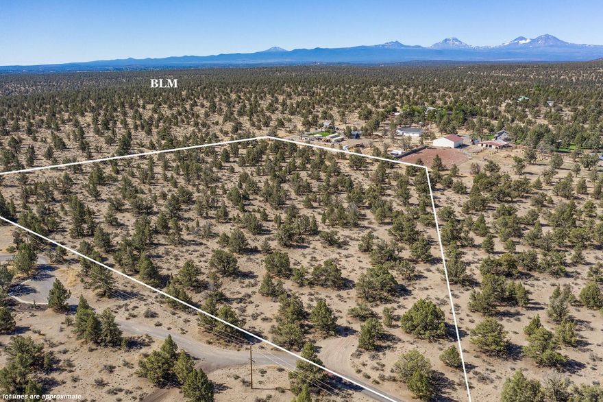 Bordering BLM land with direct access to the Maston Trail System, this 10-acre RR10 parcel is an ideal setting for equestrian use, offering immediate ride-out access to 50+ miles of trails for horseback riding and year-round recreation. The buildable homesite provides ample space for barns, arenas, dry lots, and pastures, plus potential Cascade Mountain views from a future second level. The land features level terrain, mature junipers, and multiple orientation options for designing a ranch layout. Power is at the road. Nearby amenities include the Cline Buttes recreation area, Eagle Crest, the Deschutes River, and Redmond services. A land loan option with 10% down is available; call for details. A rare opportunity to secure acreage with direct BLM access and exceptional equestrian potential in Central Oregon.