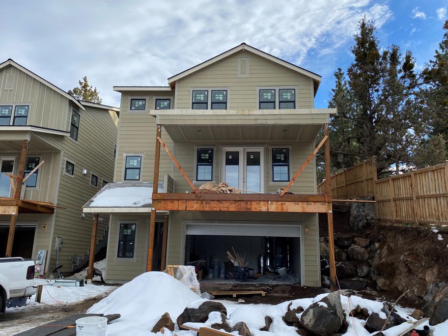 Situated on Bend's West side, Lot 10 in the new Marken Summit neighborhood is located near shopping, schools and restaurants. This Northwest Modern style home features a creative selection of finishes and an efficient floor plan fit for any buyer. Enjoy the impressive top floor primary suite featuring large walk in closet, tiled shower, and double vanities. Also on the top floor you will find two other bedrooms and another full bathroom as well as a generous bonus space. The kitchen features custom cabinets, slab quartz countertops, and stainless steel appliances. 2 car garage. Earth Advantage Certified and built by Stone Bridge Homes NW LLC.